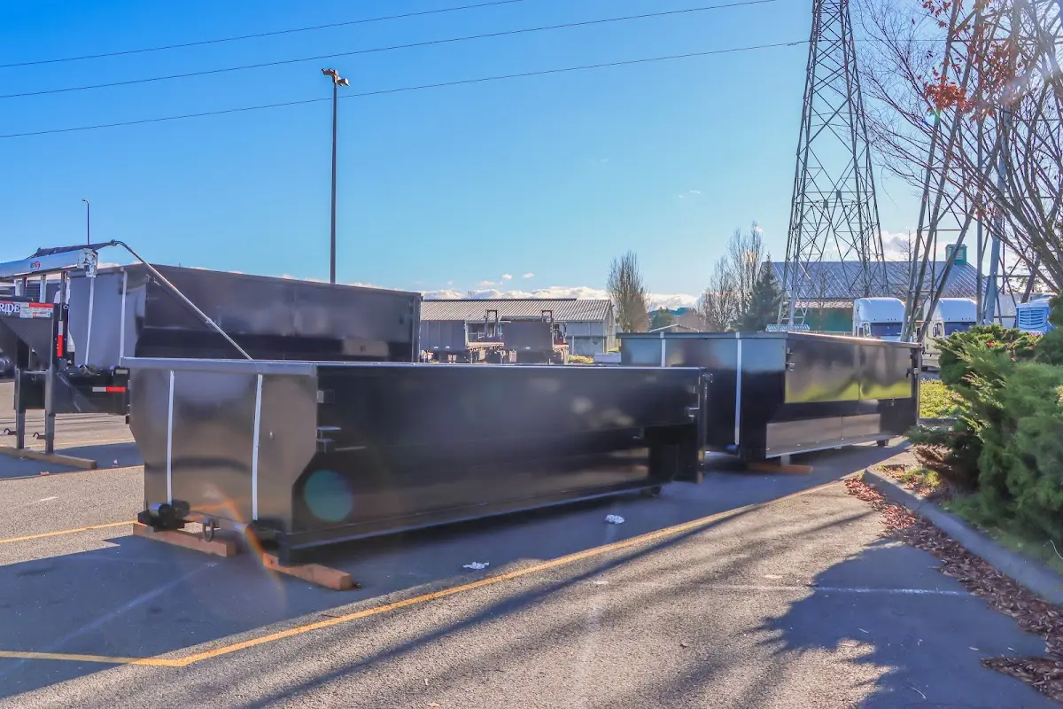 Roll-off dumpster ready for waste disposal at job site for 15 Yard Dumpster Rental in Yorktown